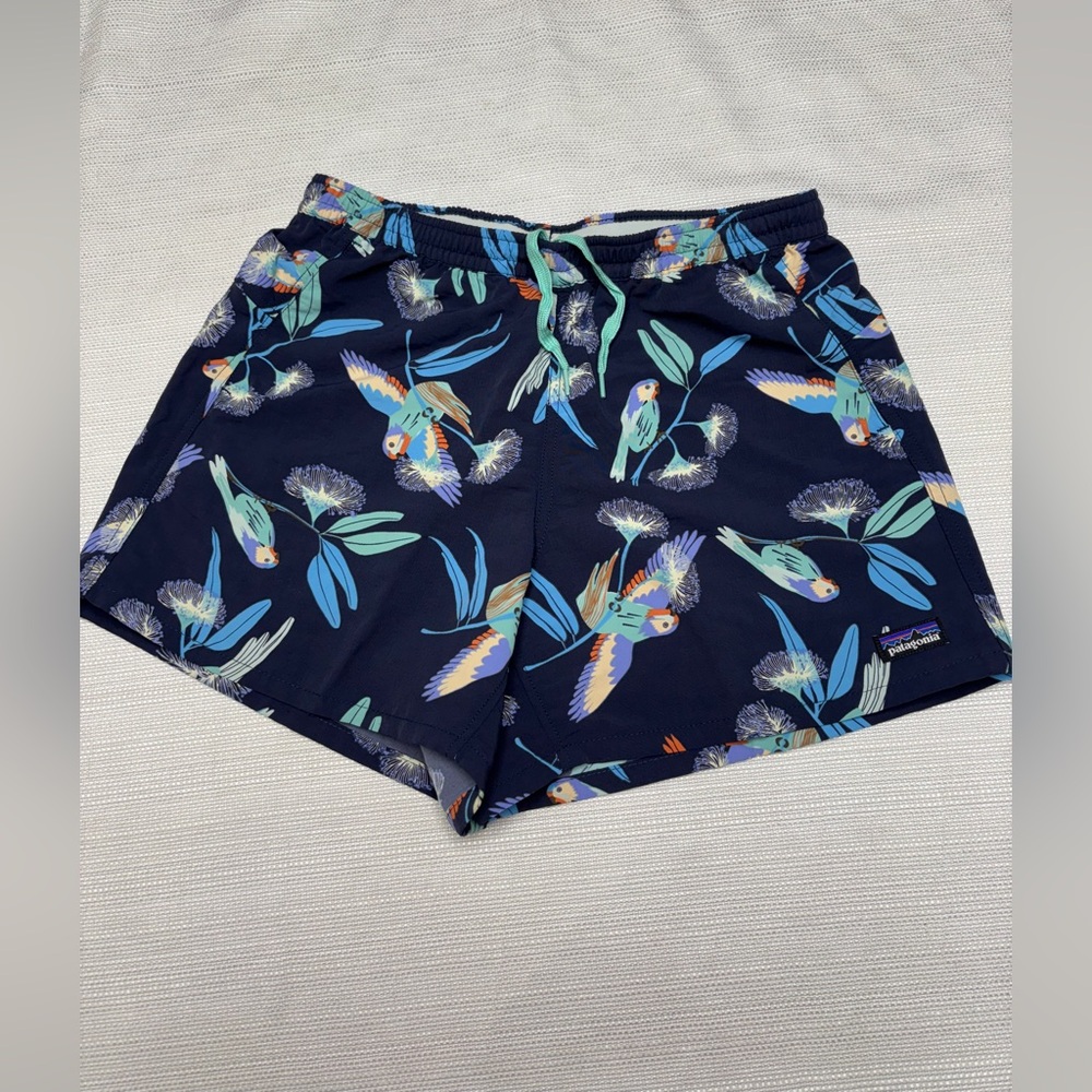 Patagonia blue shorts with parrot  design